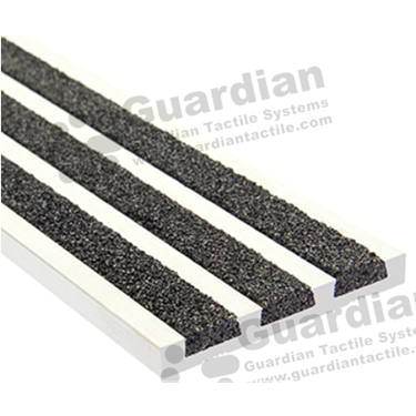 Recessed strip stair nosing in silver (5x50mm) with 3 x black carborundum infill 